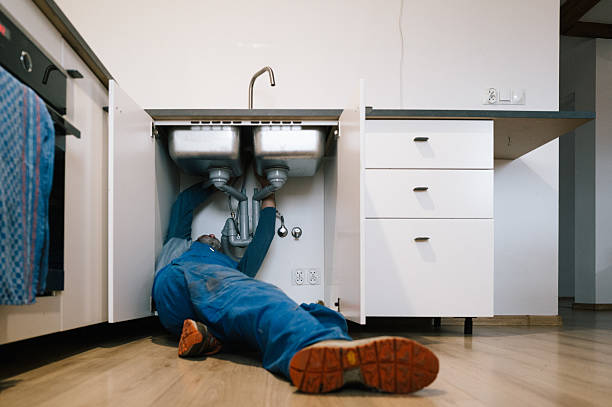 Professional Drain Cleaning technician working in Harwood, TX